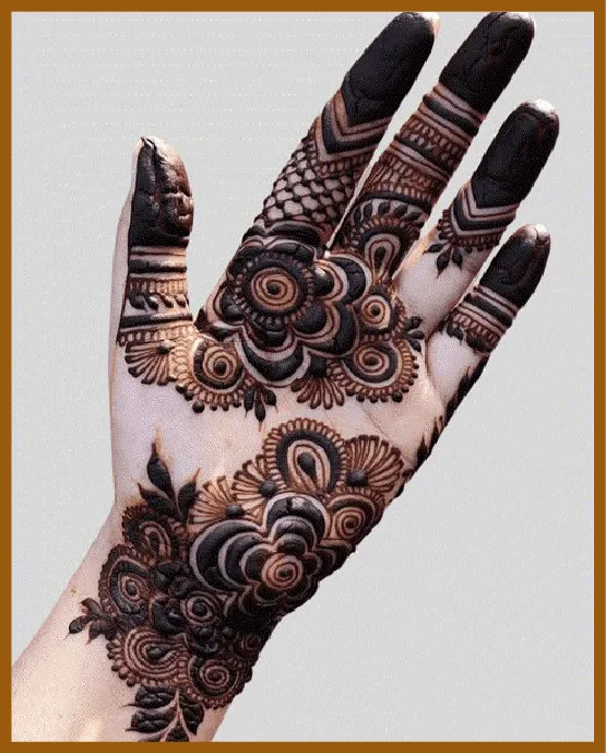 Royal Front Hand Mehndi Design Showcasing Bold Leaf Trails
